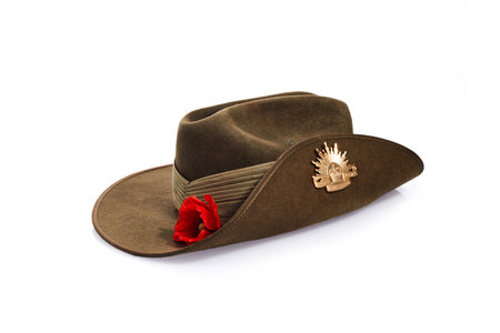 Anzac Day army slouch hat with red poppy isolated on white background.の写真素材