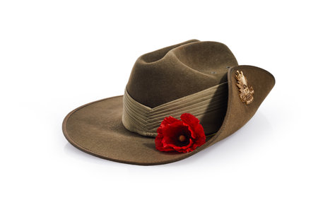 Anzac Day army slouch hat with red poppy isolated on white background.の写真素材