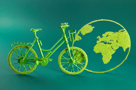 World Bicycle Day. Green bicycle and world. Environment preserve.の写真素材