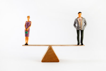 Gender equality concept. Male and female on the scales with balanceの写真素材