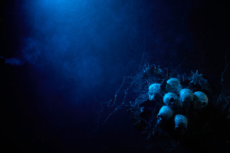 Halloween human skulls in abstract smoke on black background.の写真素材