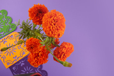 Marigold flowers and candles used for Mexican altars at day of the dayの写真素材