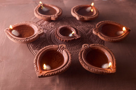 Burning diya on Happy Diwali, background for light festival of Indiaの写真素材