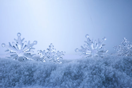 Blue Christmas snowflakes background. Winter background with snowflakes.の写真素材
