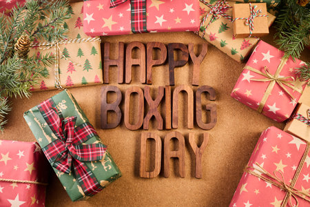 Boxing Day Concept. Different kinds of gift boxes on wooden backgroundの写真素材