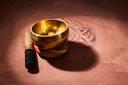 A close up of a tibetan singing bowl or himalayan bowl for therapy, meditation and relaxation.の写真素材