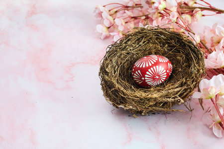 Red Easter egg on marble background. Happy Easterの写真素材
