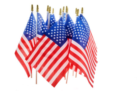 Memorial or America independence day. Row of American Flags on White Backgroundの写真素材
