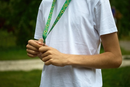 Sunflower lanyard, symbol of people with invisible or hidden disabilities.の写真素材
