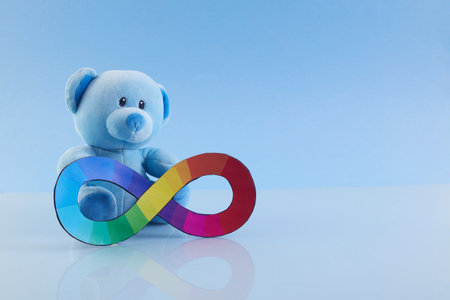 Teddy with Infinity symbol. Autism awareness. Neurodiversity awareness and acceptanceの写真素材