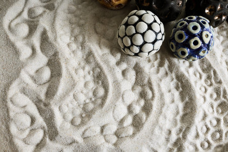Textured Sand and Patterned Stones