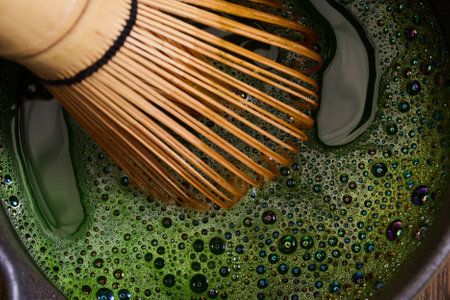 Matcha Whisking. Elegant matcha tea setup with whiskの写真素材