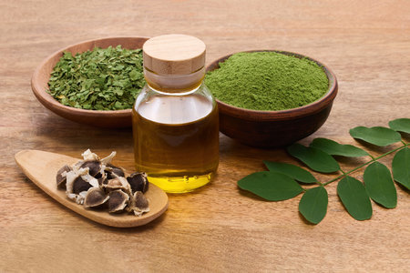 Moringa Ingredients on wooden backgroundの写真素材