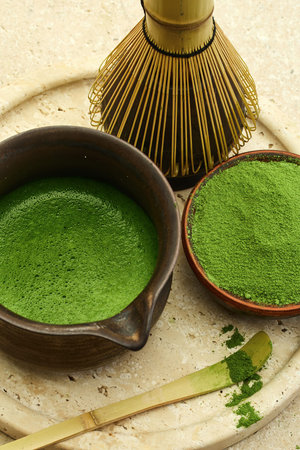Traditional Matcha Setup. Ceremonial matcha with bamboo whisk, bowl