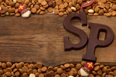 Dutch holiday Sinterklaas, St. Nicholas background with kruidnoten, pepernoten, traditional sweetsの写真素材