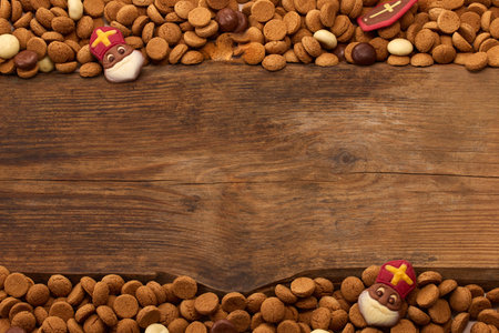 Dutch holiday Sinterklaas, St. Nicholas background with kruidnoten, pepernoten, traditional sweetsの写真素材