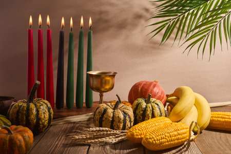 Kwanzaa. African holiday Kwanzaa with decoration of seven candles and pumpkinsの写真素材