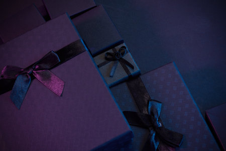 Elegant Gift Boxes. Image featuring elegant gift boxes wrapped in dark hues with silk ribbons,の写真素材