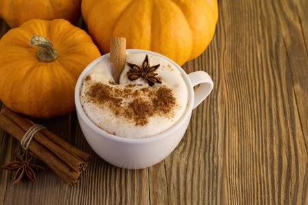 Pumpkin Spice Latte. A cozy autumn latte with cinnamon, star anise, and pumpkinsの写真素材
