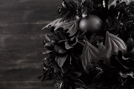 Gothmas. Gothic Holiday Decor. Dark festive wreath with black bats and flowers creating a mysterious atmosphere.の写真素材