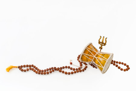 Maha Shivratri. Damaru drum with trident and rudraksha mala symbolizing shivaの写真素材