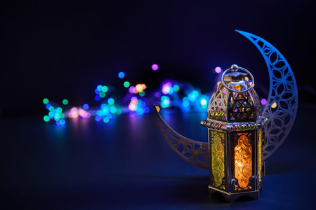 Ramadan kareem golden lantern with crescent moon