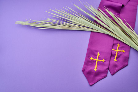 Purple stole and palm leaf for palm sundayの写真素材