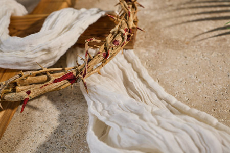 Crown of thorns on cross symbolizing sacrifice and resurrection