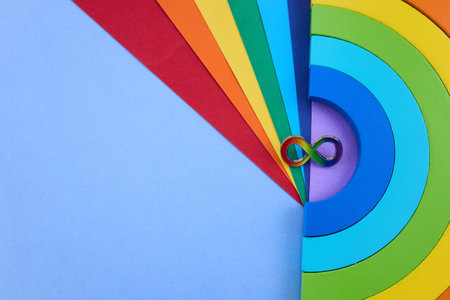 Neurodiversity infinity symbol on vibrant rainbow spectrum