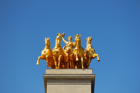 Golden horses and carriage statue on Cascada fountain in Barcelonaの写真素材