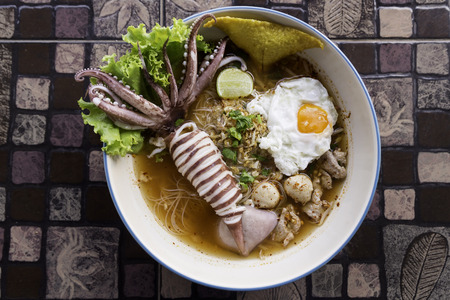 Thai style noodle, tom yum,squid noodle soupの写真素材