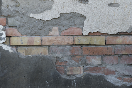 old stone damaged backgroundの写真素材