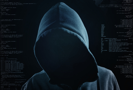 hacker at work with graphic user interface aroundの写真素材