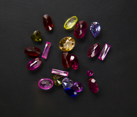 Jewel or gems on black shine color, Studio shot of beautiful gemstonesの写真素材