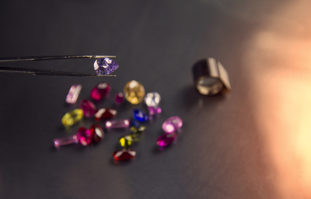 Jewel or gems on black shine color, Studio shot of beautiful gemstonesの写真素材