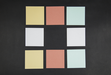 color note sticker on blackboardの写真素材