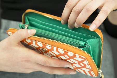 woman holding walletの写真素材