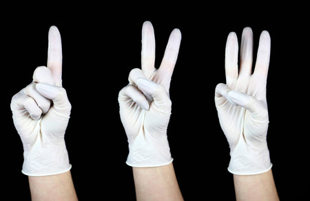 hand with white Glove on black