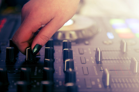 DJ Hand Mixing on Controllerの写真素材