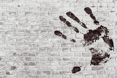 hand print on wall backgroundの写真素材
