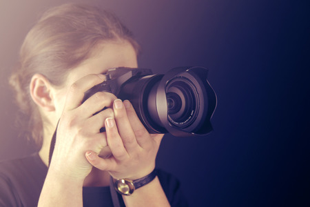 Photographer Holding Cameraの写真素材