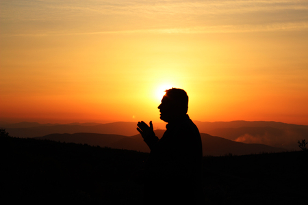 a man at sunsetの写真素材