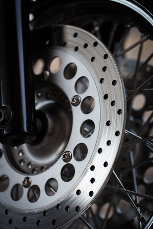 Motorcycle wheel disc brake background in modern scooter bikeの写真素材