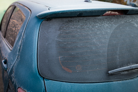 A matte car in the winter. Hoarfrost by car.の写真素材