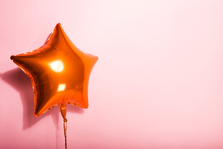 Star sphere on a pink backgroundの写真素材