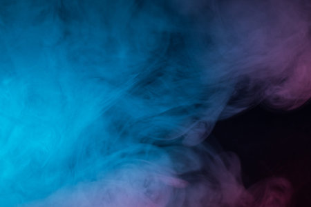 Colorful smoke close-up on a black background
