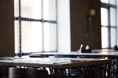 Vintage room cafe or restaurant. Tables opposite the window.の写真素材