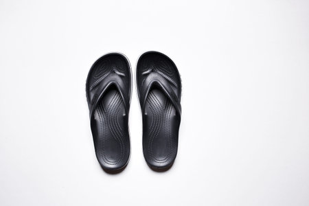 Flip Flops on a white isolated background. Men's black flip flops.