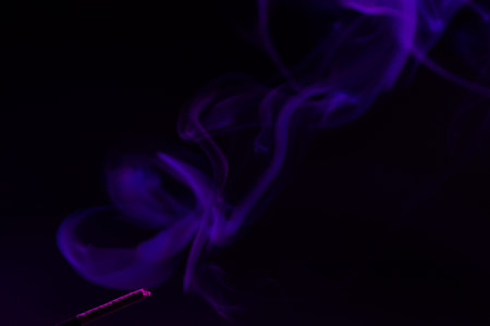 Colorful smoke close-up on a black background