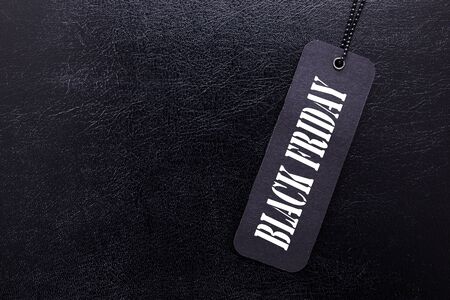 Label with the words Black Friday on a black background.の写真素材